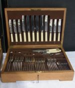 Service of EPNS table flatware for six persons, Old English pattern in oak table canteen