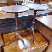 Two reproduction mahogany wine tables with dished circular tops, on splayed tripod legs, diameter