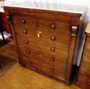 Nineteeth century mahogany chest of two short and four long graduated drawers, on bun feet, width