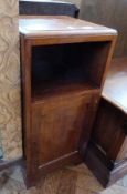 A walnut bedside cupboard with open shelves and cupboard below on bracket feet, width 30cms,