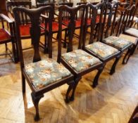 Set of four mahogany dining chairs, with vase-shaped slatback, stuffover seats on cabriole