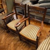 Pair Victorian oak open armchairs with reeded and pierced decoration to back, turned column to arms,