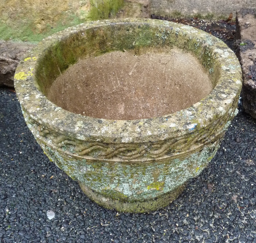 A stone jardiniere