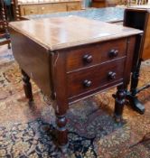 A mahogany Pembroke table with two small frieze drawers to one end and pair dummy drawers to the