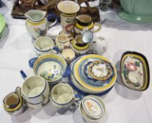 Large quantity Quimper and similar pottery including vases, jugs, bowls, plates and trinket dishes