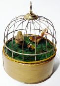 Birdcage musical box, circular and domed with two model birds