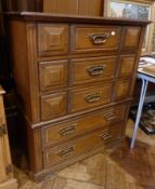 A modern oak chest of five long drawers, moulded drawer fronts on bracket feet, width 97cms