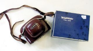 Voigtlander camera in case with instruction manual and certificate receipted 1961 in original box