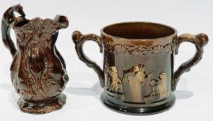 19th century treacle glazed frog loving mug decorated with moulded figures and dogs, interior of a