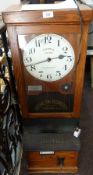 National Time Recorder Company Limited London time recorder, in oak case, with electric movement,