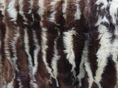 Late Victorian/Edwardian fur car rug, of German origin, with beaver-lined pockets, 145cm x 197cm