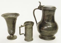 A pewter jug bearing crowned rose mark to base, pewter tapering and bulbous tankard, tapered