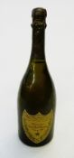 One bottle of Moet et Chandon a Epernay Dom Perignon 1980 Champagne (top-shoulder).