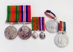 WWII replica war medal and defence medal with ribbons and miniatures