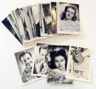 Collection of film star publicity photographs, some signed, including:- Robert Taylor, Mickey Rooney