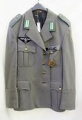 Grey military jacket with third reich cloth badge to chest