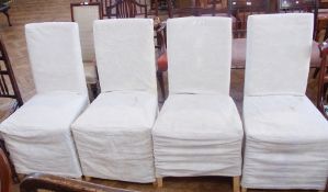 Four Ikea style upholstered dining chairs with loose covers