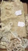 Lace bordered cream gauze stole, a cream net lace panel and other pieces