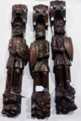 Set of three late 19th century/early 20th century oak carvings of medieval knights with helmets