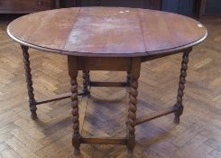 20th century oak gateleg table, on turned stile supports united by stretchers, 120cm when extended