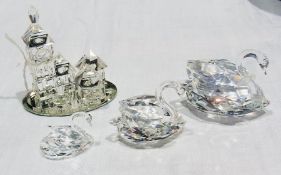 Set of three Swarovski style glass swans and miniature village