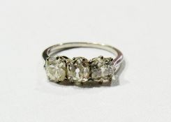 White metal and three-stone diamond ring, old cut stones, claw set