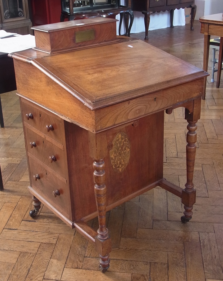 Late Victorian walnut Davenport with pen box, having lift up lid to top, sloping lid to the