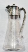 WITHDRAWN

Victorian EPNS mounted engraved glass claret jug, having hinged lid and foliate