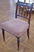 Set of six 19th century mahogany Regency style dining chairs, each with reeded railback, stuffover