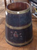 An old oak barrel with brass mounts, with worn coat of arms to front, 53cm high