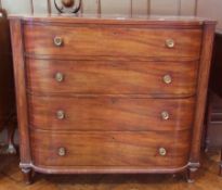 Regency mahogany bowfronted chest of four long graduated drawers with stamped brass handles, with