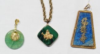 Oriental jade and gold-coloured metal pendant, another oriental pendant set malachite and another