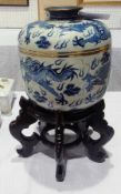 Large Oriental covered porcelain canister, the domed cover with raised circular everted handle all