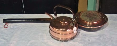 Old copper warming pan with turned wood handle and a copper kettle (2)