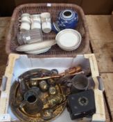 A quantity of brass items, decorative coffee cups, ginger jar, and other items in wicker basket