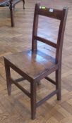 Antique oak and hardwood dining chair, the plain back with cross rail, panel seat on square tapering