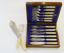 Pair EPNS and yellow-handled fish servers, stylised leaf engraved with matching boxed set of six