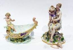 Meissen style figure of Mother and Child, the classical figure seated with cherubesque figure on her