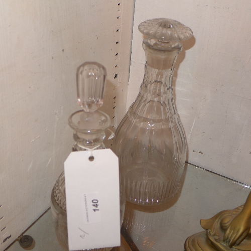 Two cut glass decanters with stoppers