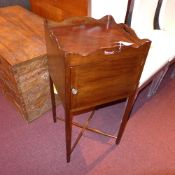 A C19th mahogany tray top night table fitted single panel door raised on stretchered supports