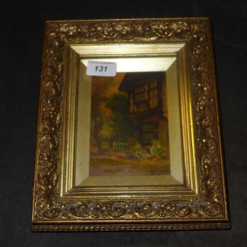 A small oil on canvas of a Tudor Cottage signed Han 1937