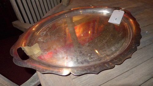 A silver plated oval form tray with twin handles W 62 cm