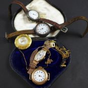 An Art Deco 9ct gold watch in original box together with four other various wristwatches