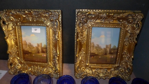 A pair of oils on board of castle scenes in gilt frames