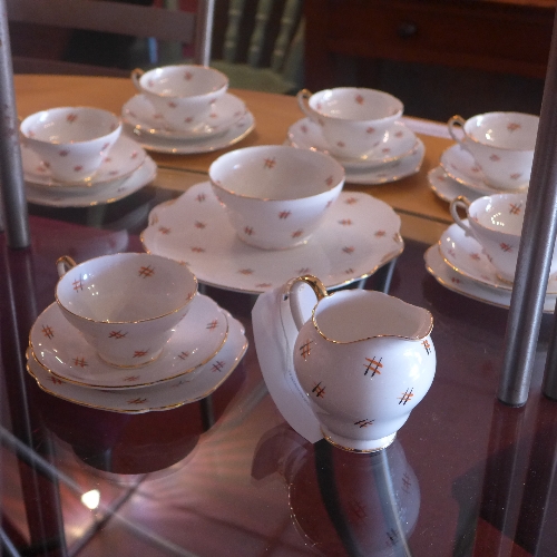 A Stanley bone China part tea service the white glaze heightened in gilt