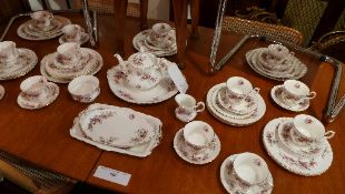 A Royal Albert Lavender Rose pattern extensive tea set including tea set, cups, saucers, plates and