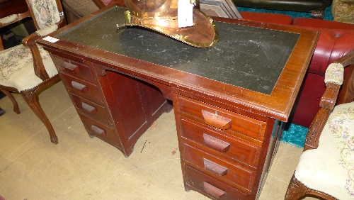 A 1950`s mahogany pedestal desk