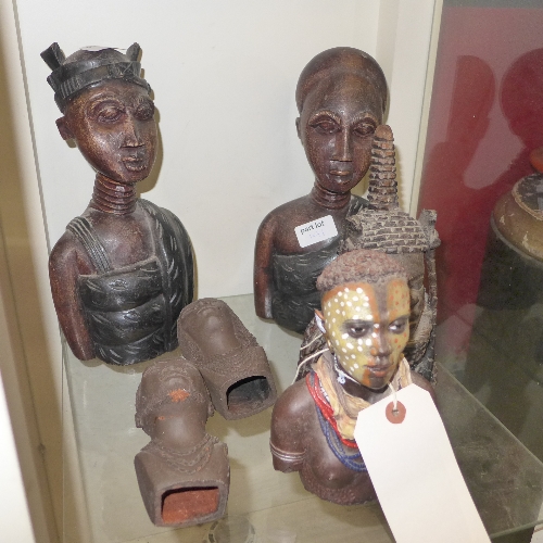 Six carved Zimbabwean figures