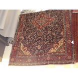 An extremely fine North West Persian Sarouk carpet the pendant floral medallion with Shah Abbas