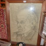 A pencil portrait of Lenin glazed and in an oak frame